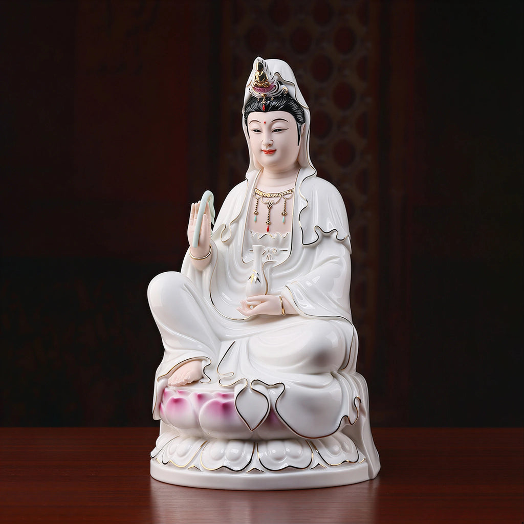 Angled view of the polychrome Guanyin and gold-toned painted details
