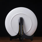 Reverse of the Dehua porcelain display plate with folding stand