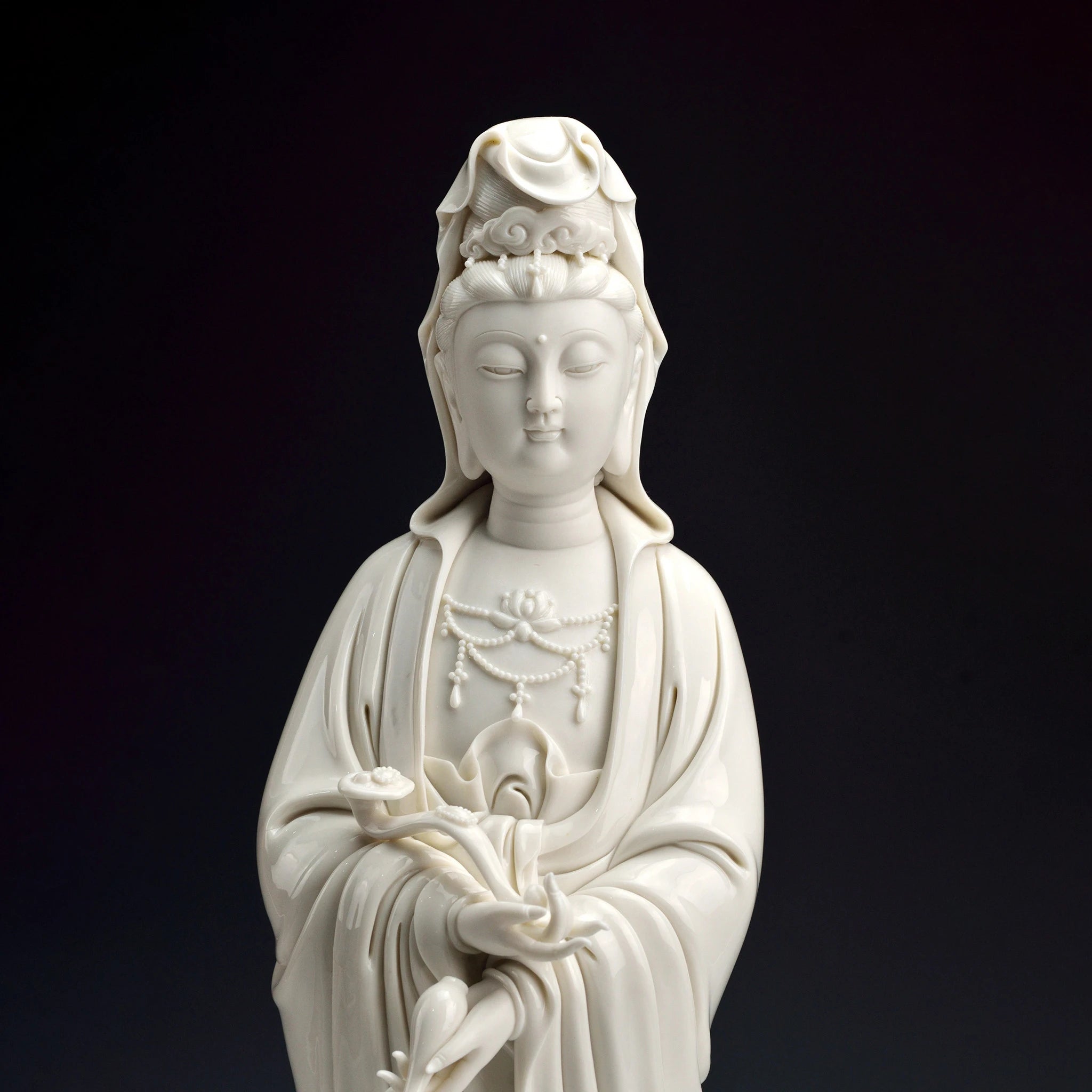 Close view of the standing Guanyin face, headdress and upper robes