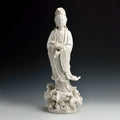 White Dehua porcelain standing Guanyin holding a ruyi scepter