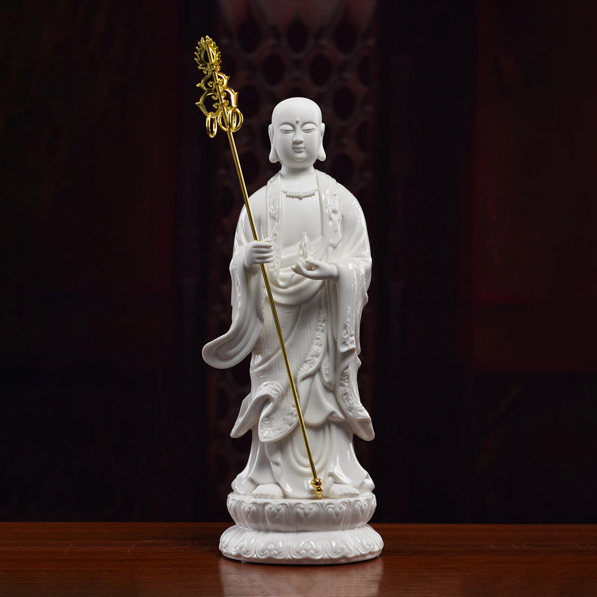 Front view of standing white Dehua porcelain Ksitigarbha with monk's staff