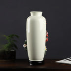 Rear view of the ivory-white straight-neck porcelain vase and black stand