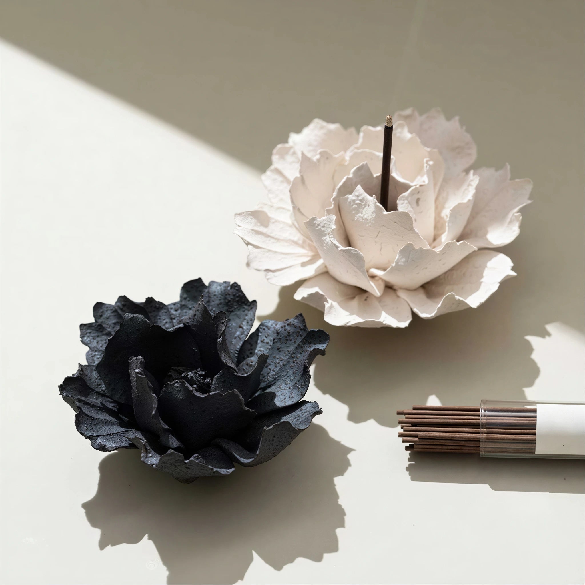 Front view of the textured ceramic blossom and wood tray set