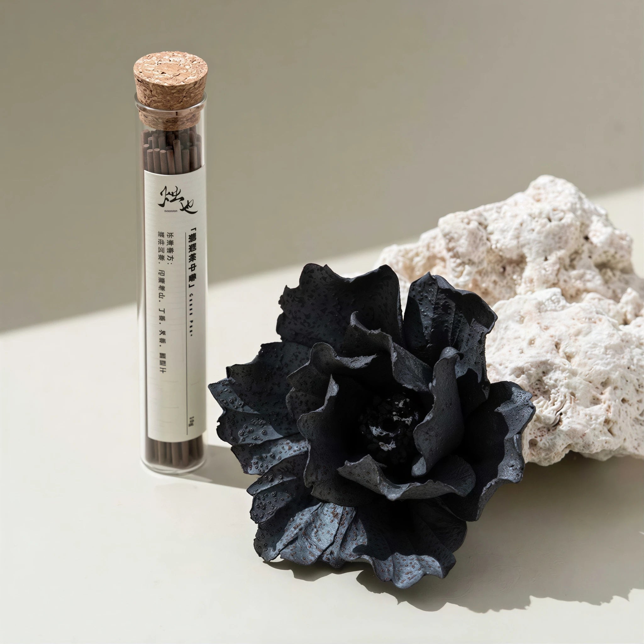 Volcanic black ceramic blossom with tray and care tools