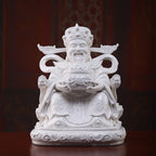 White porcelain Wen Caishen with treasure bowl and flowing ribbons
