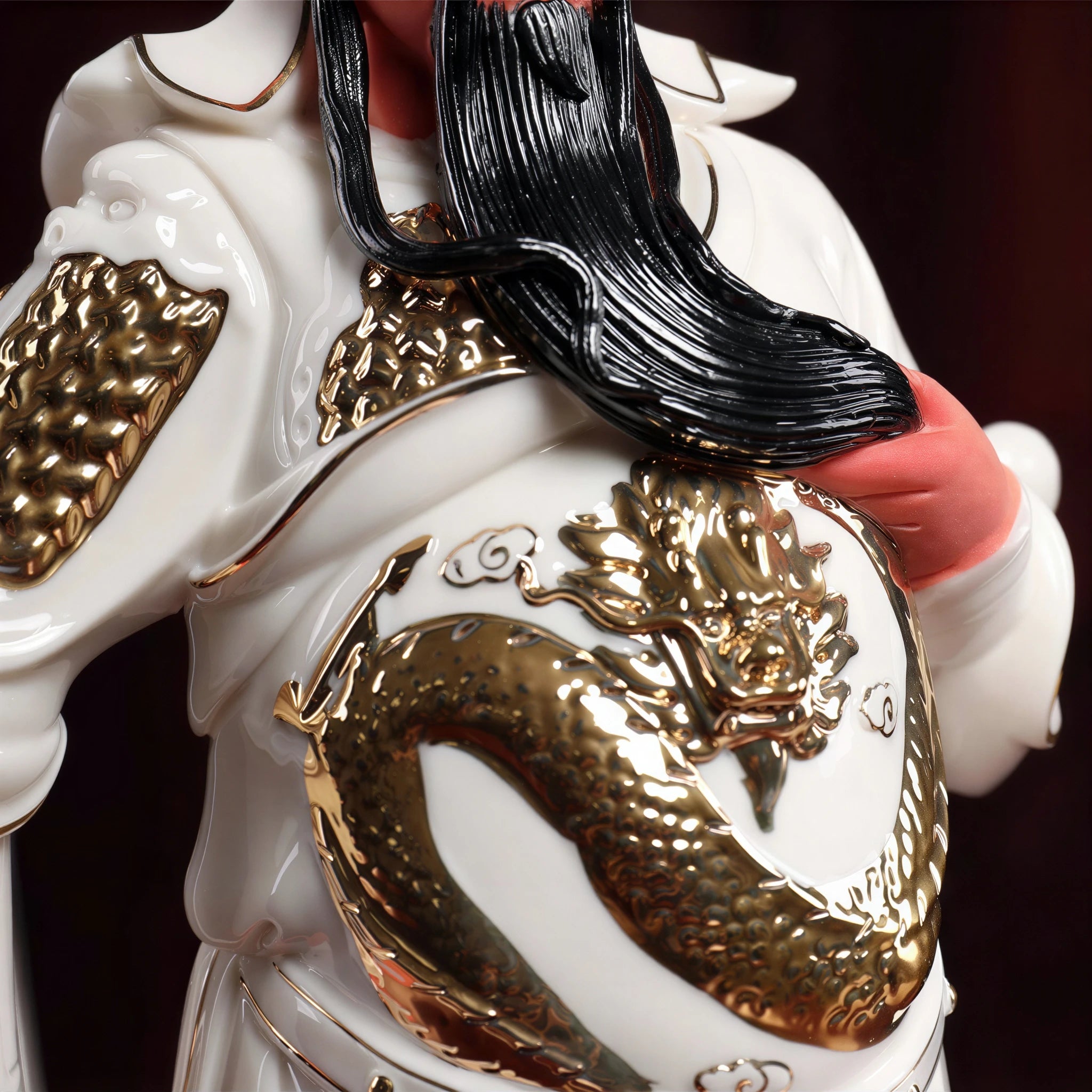 Close view of the dragon breastplate and gold-toned armor lines