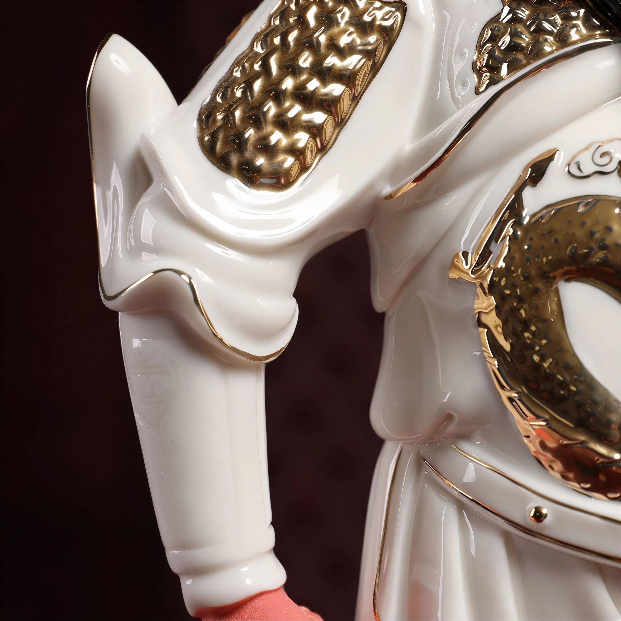 Detail of the sleeve guard and gold-toned painted decoration