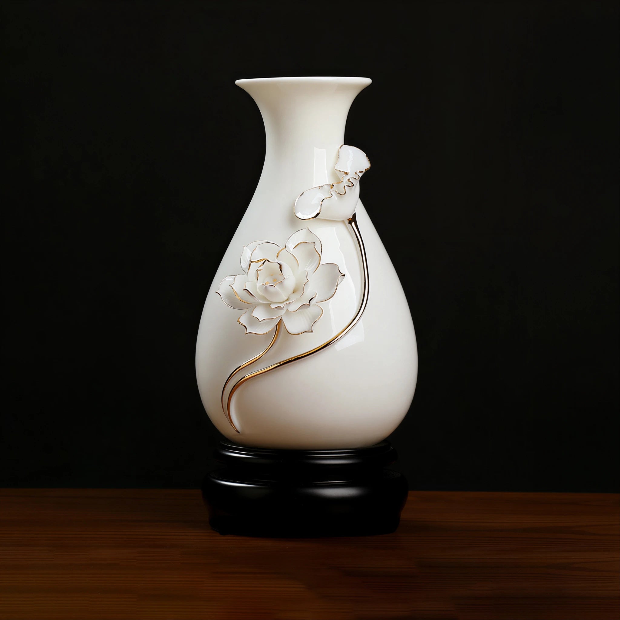 White and gold-toned lotus relief on a Dehua porcelain vase