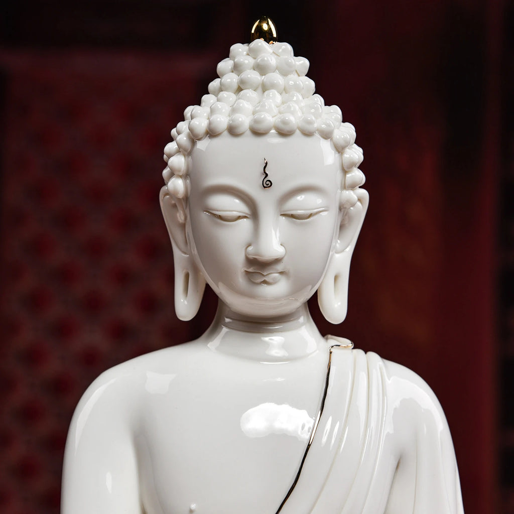 Close view of the white Medicine Buddha face and ushnisha