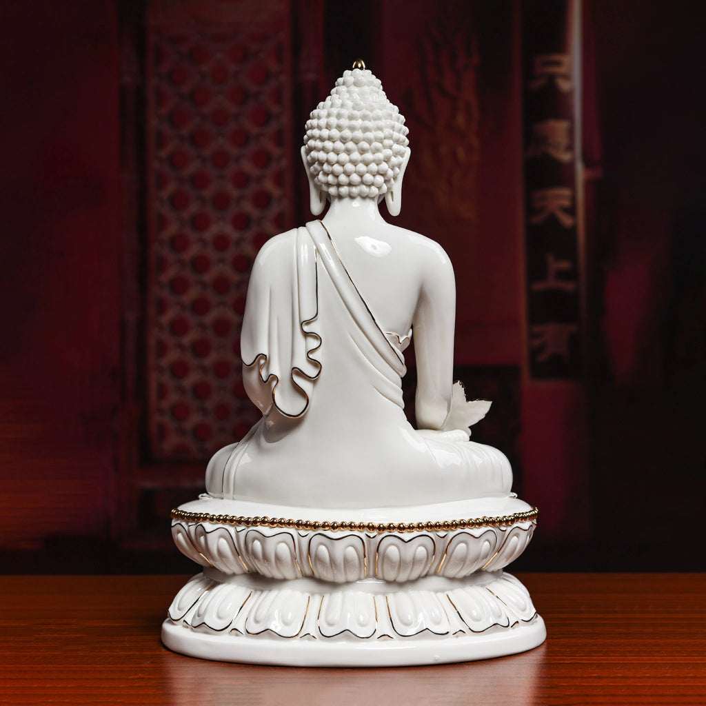Rear view of the white porcelain robes on the Medicine Buddha sculpture
