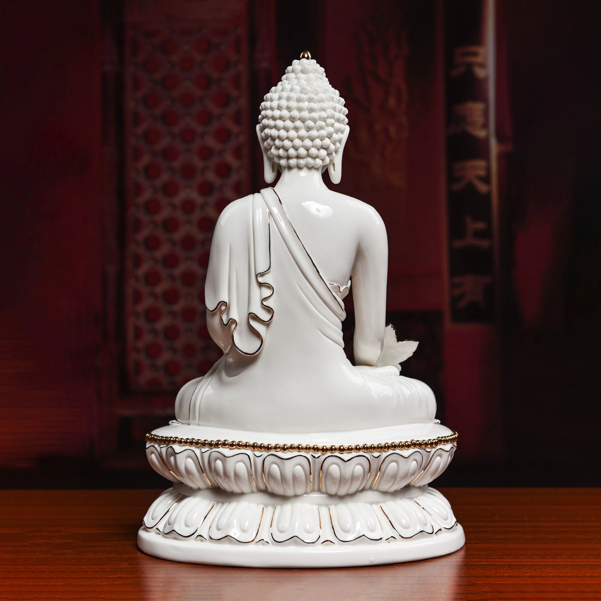 Rear view of the white porcelain robes on the Medicine Buddha sculpture