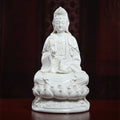 Front view of a white Dehua porcelain Guanyin holding willow and a vase