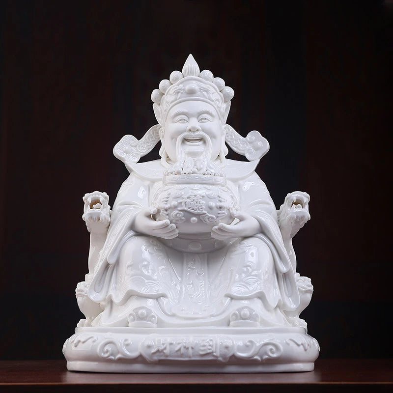 Seated Dehua porcelain Wen Caishen on a carved throne