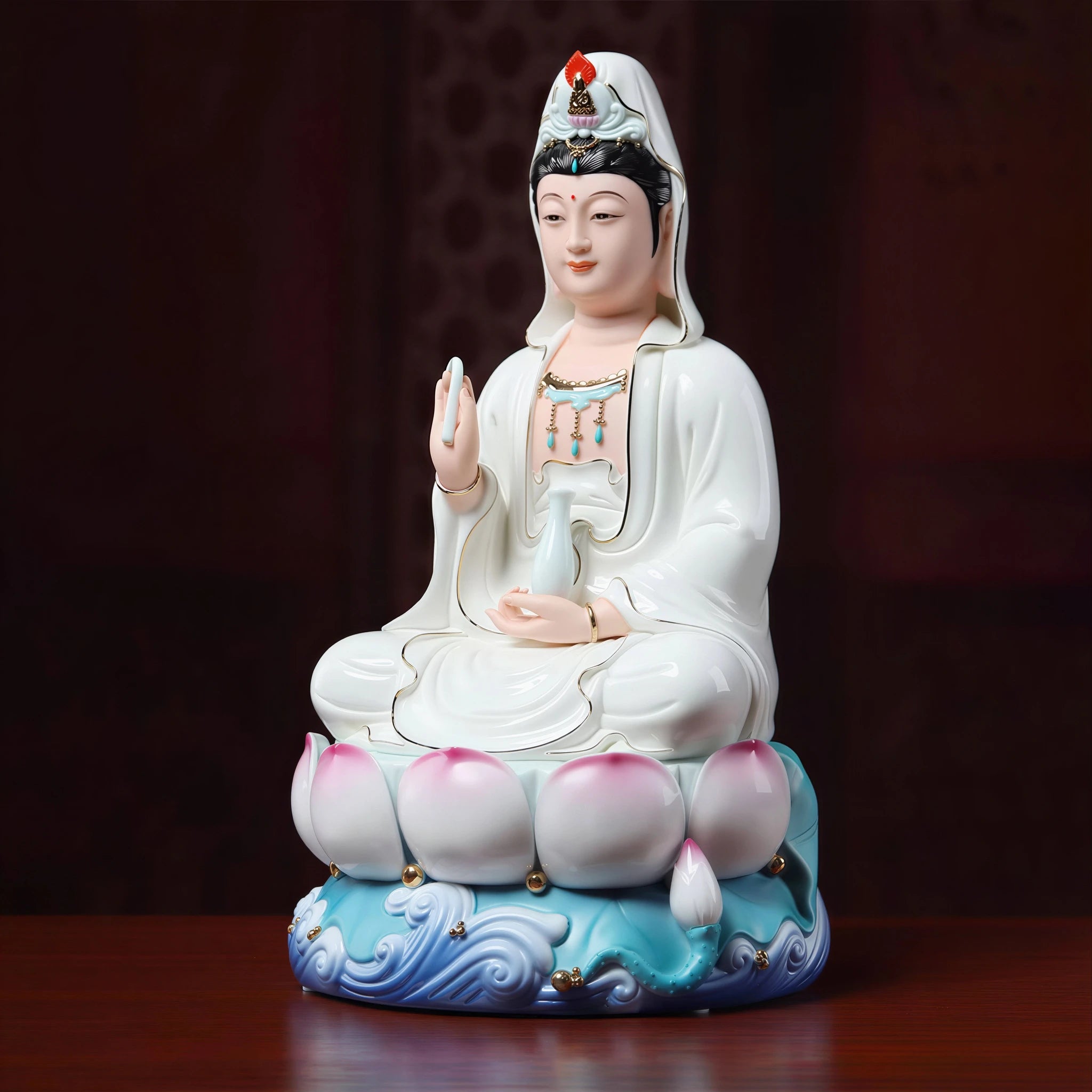 Angled view of the white-robed Guanyin and lotus base