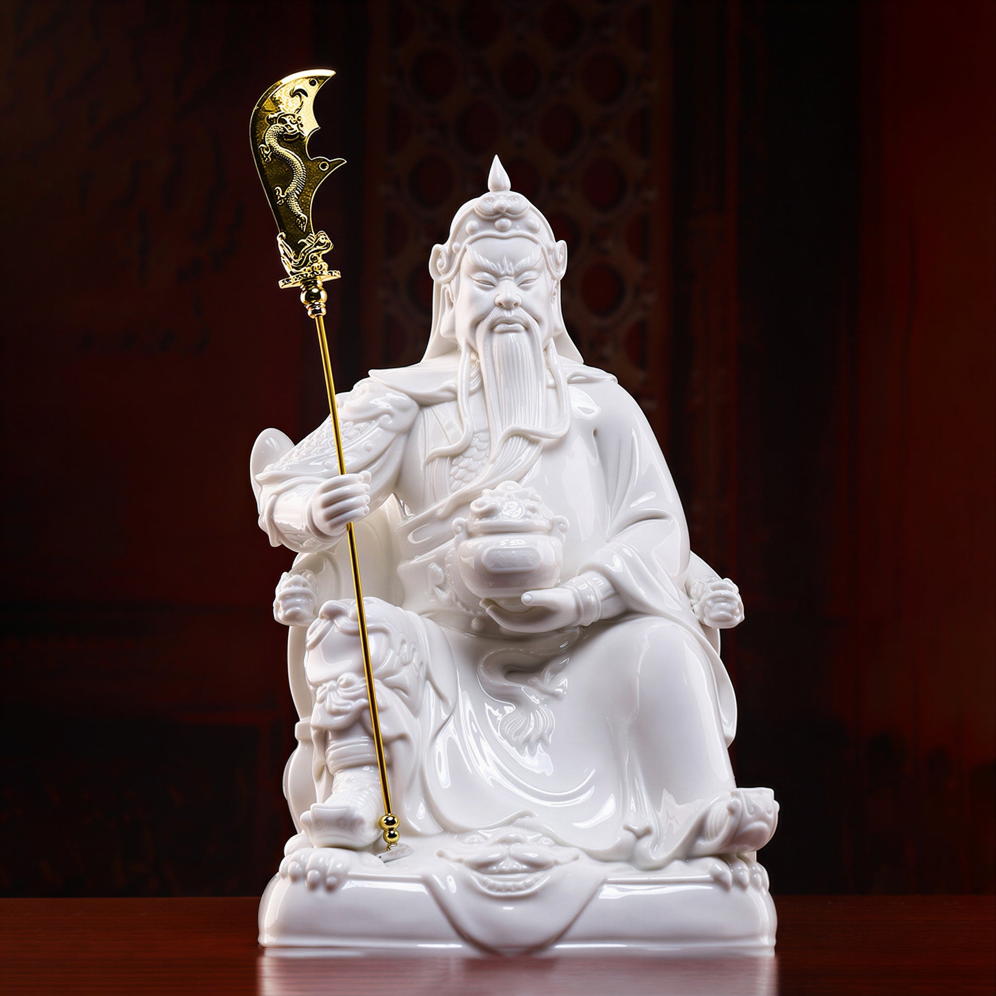 Angled view of the white Dehua porcelain Guan Gong with crescent blade