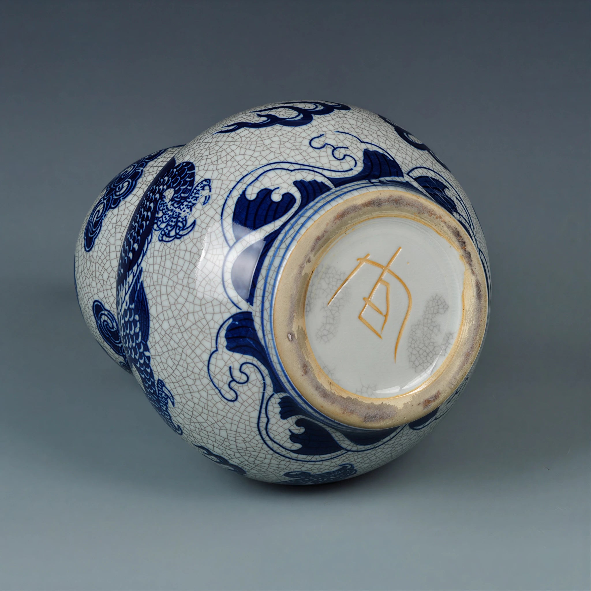 Underside of the double-gourd vase with a gold-colored decorative character mark