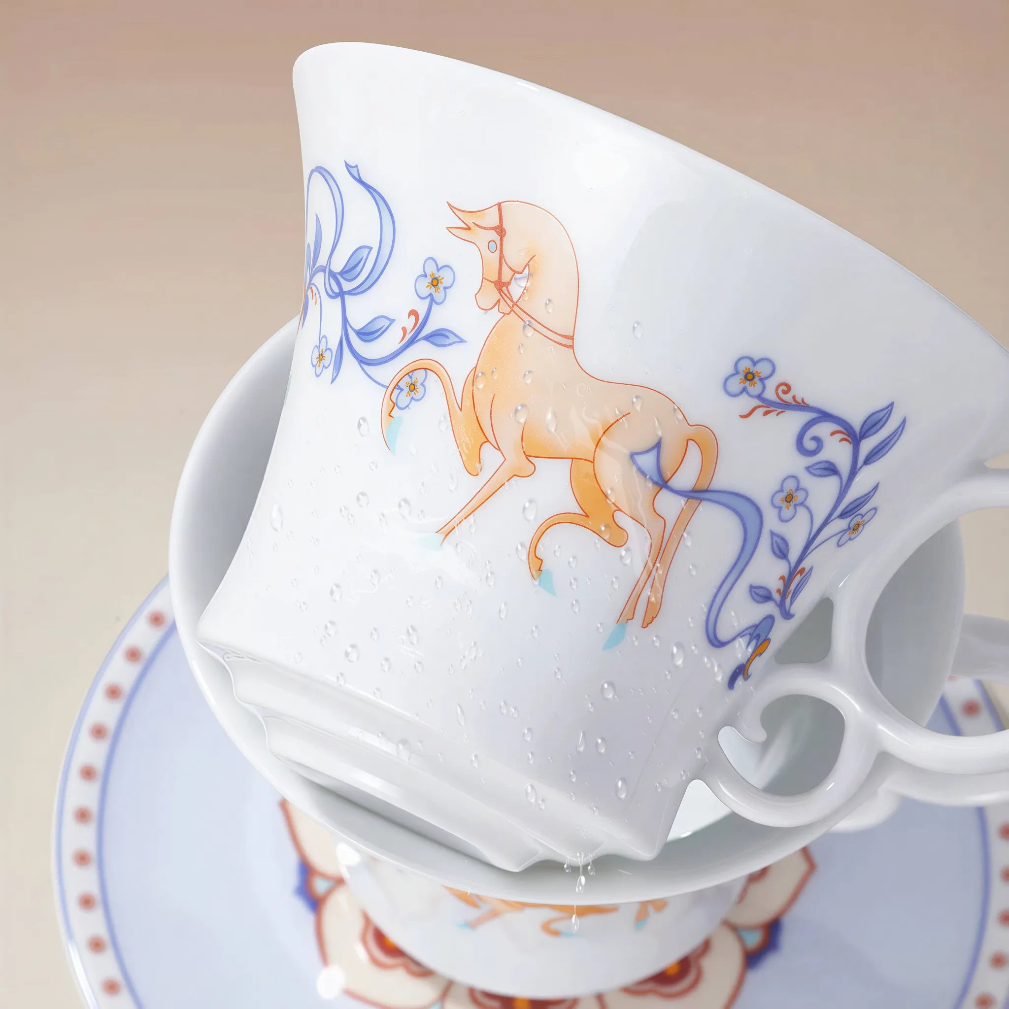 Lapis blue, warm yellow, and lotus detail on the coffee cup