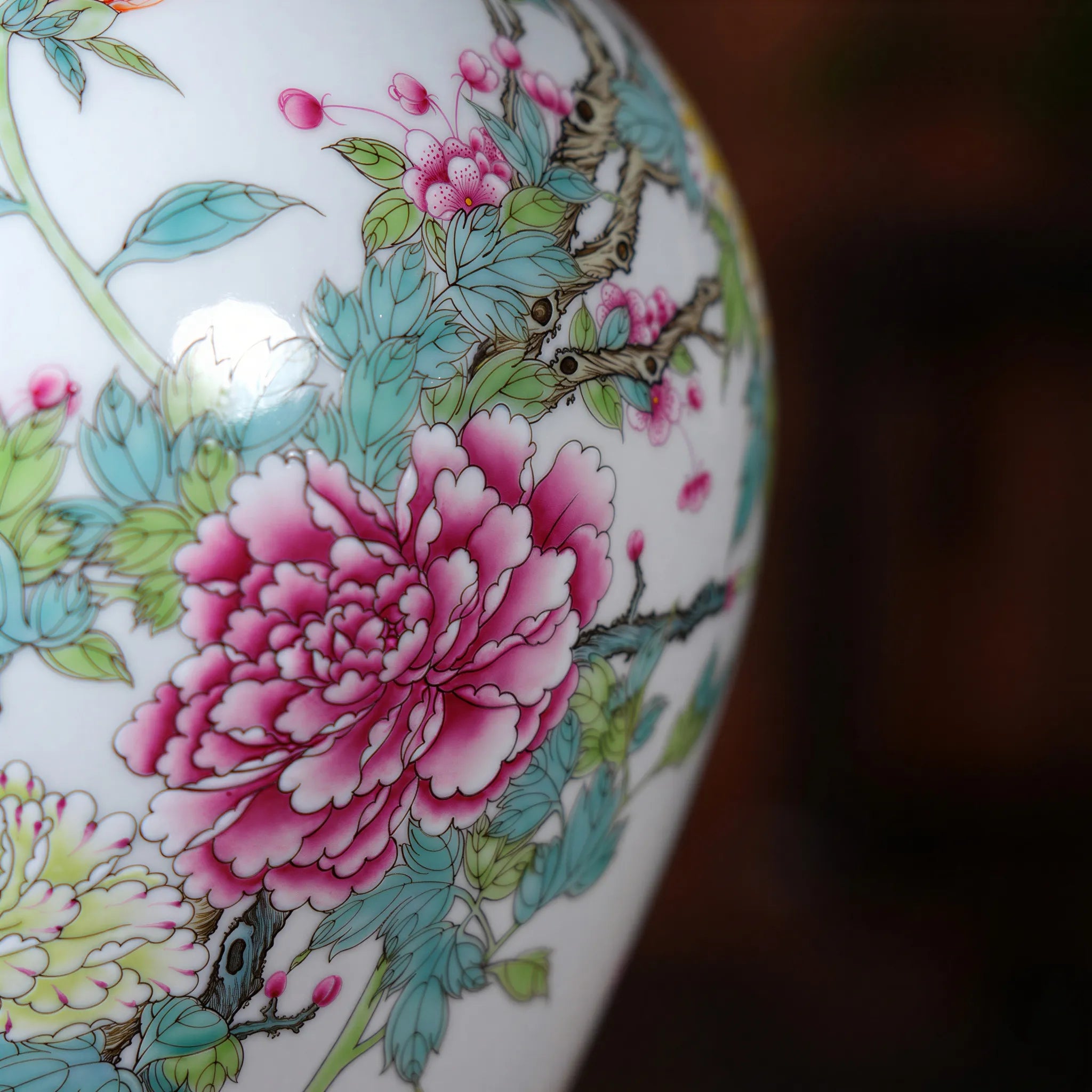 Peony and floral-scroll enamel detail on the baluster jar