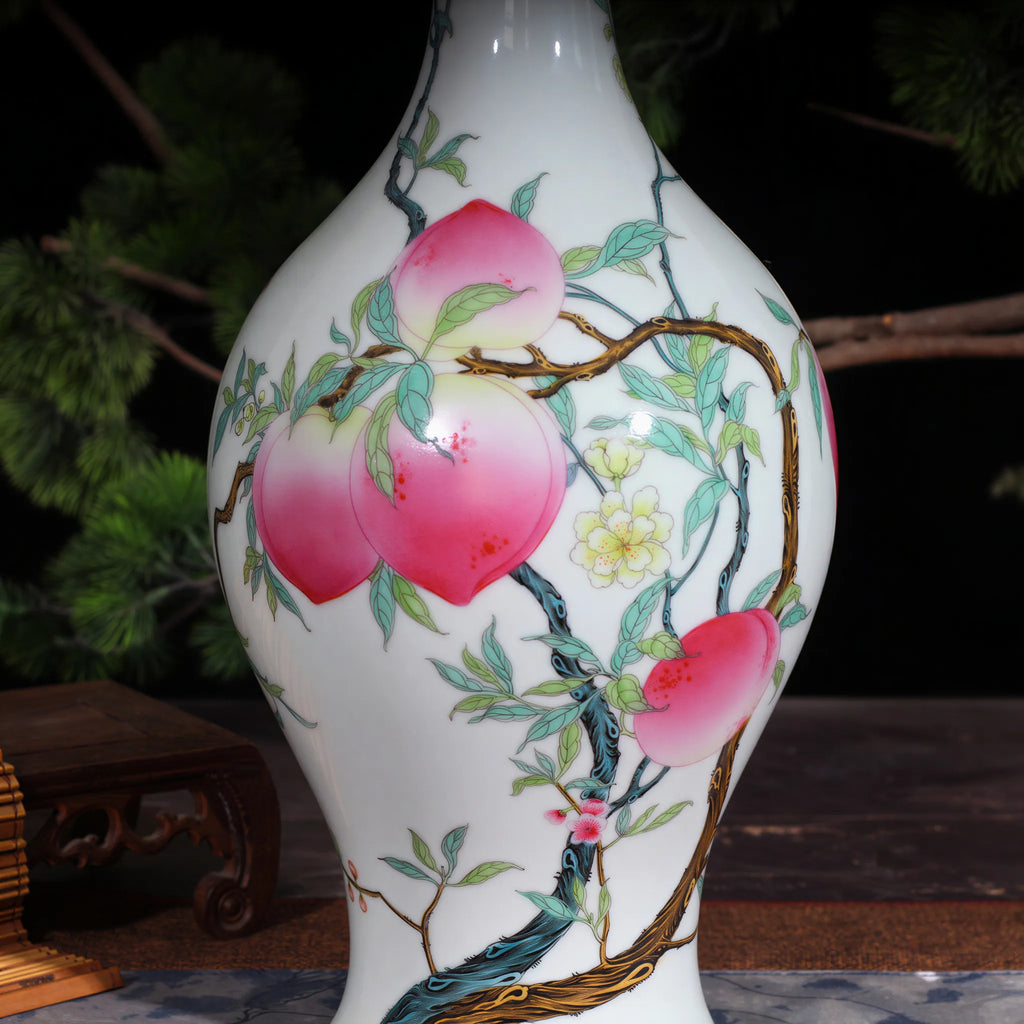 Eight-peach and red-bat motif on the famille rose vase