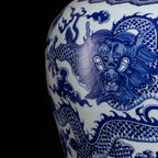 Hand-painted dragon, cloud, and wave motif in cobalt blue