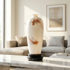 Goldfish Meiping vase on its dark wooden stand on a marble table in a light living room