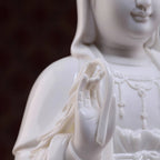 Detail of the raised hand on the seated Guanyin