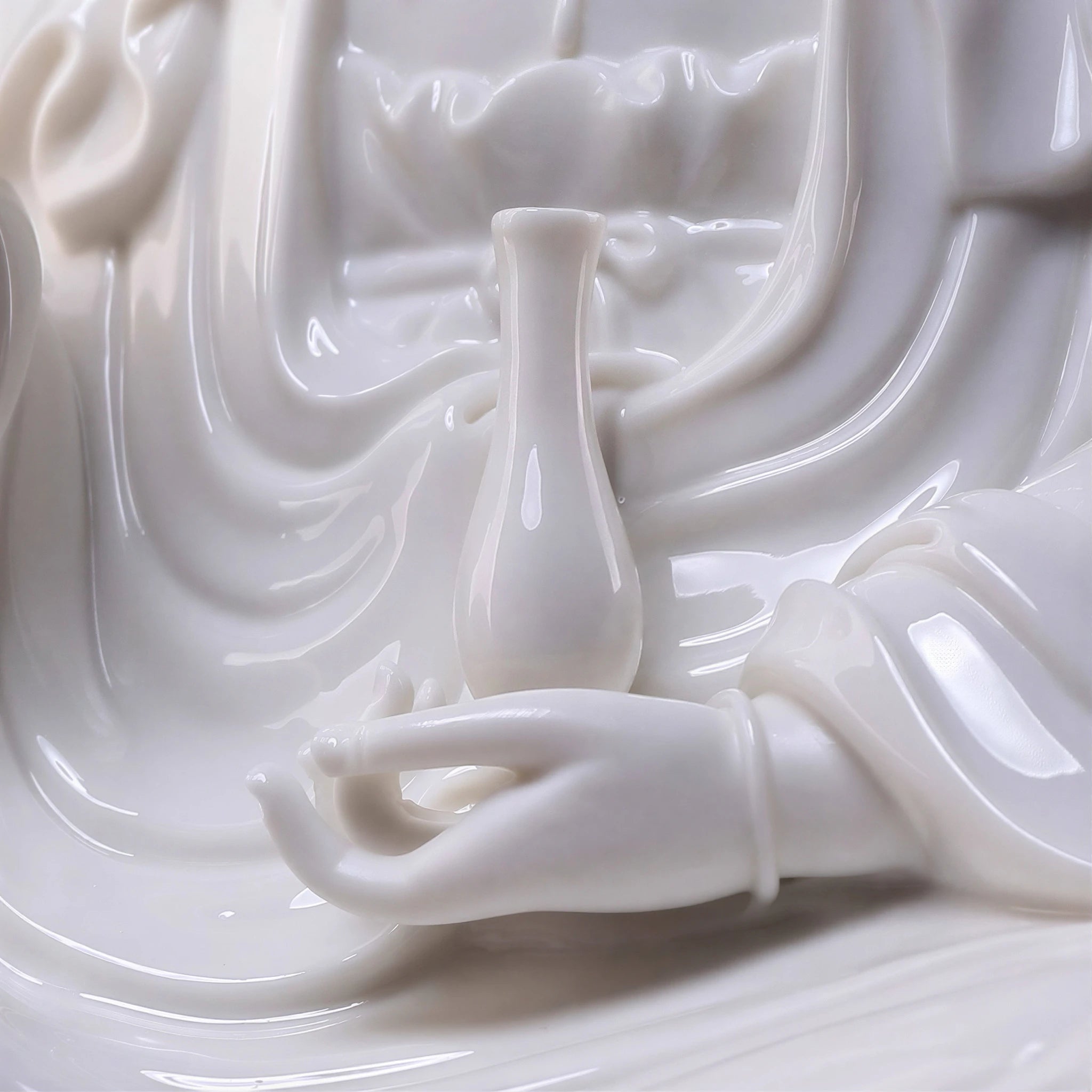 Detail of the vase held at the center of the Guanyin sculpture
