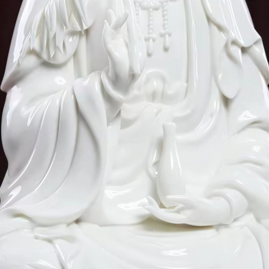 Detail of the willow branch and vase held by Guanyin