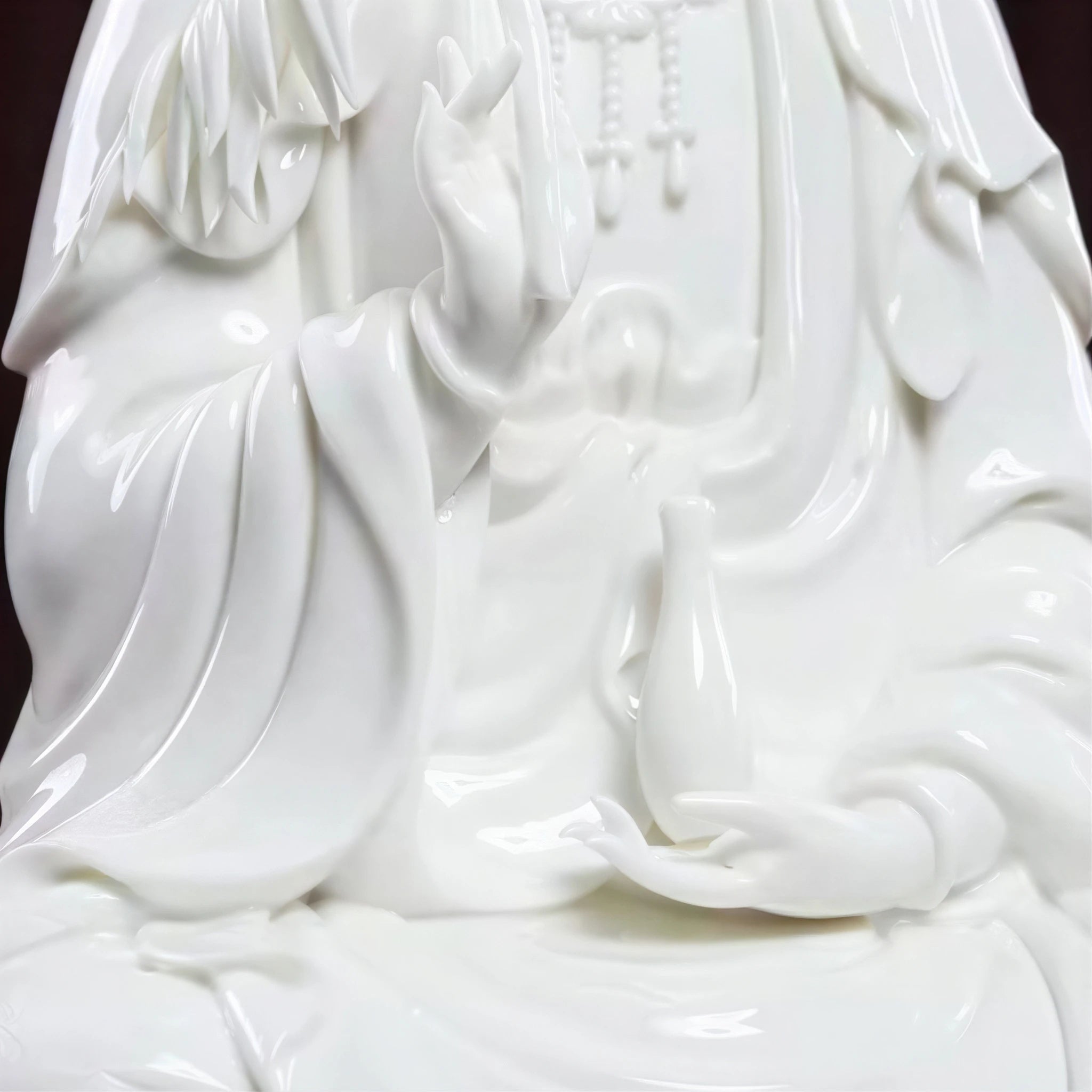 Detail of the willow branch and vase held by Guanyin