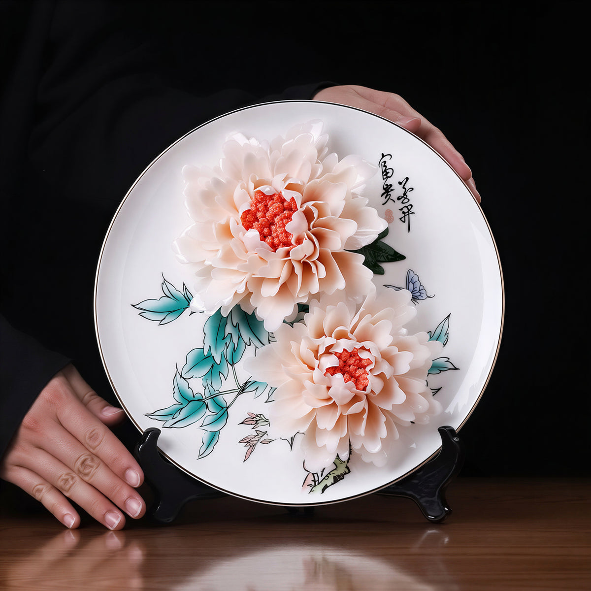 Hand-held scale view of the Dehua peony porcelain display plate