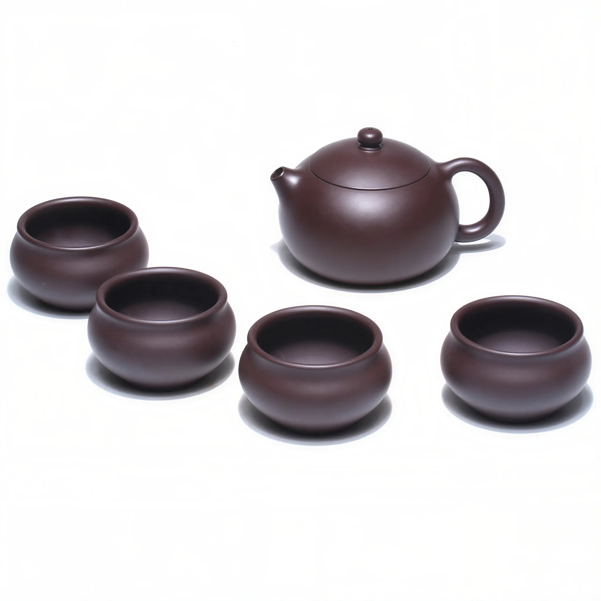 Huanglongshan Xishi teapot with four matching cups