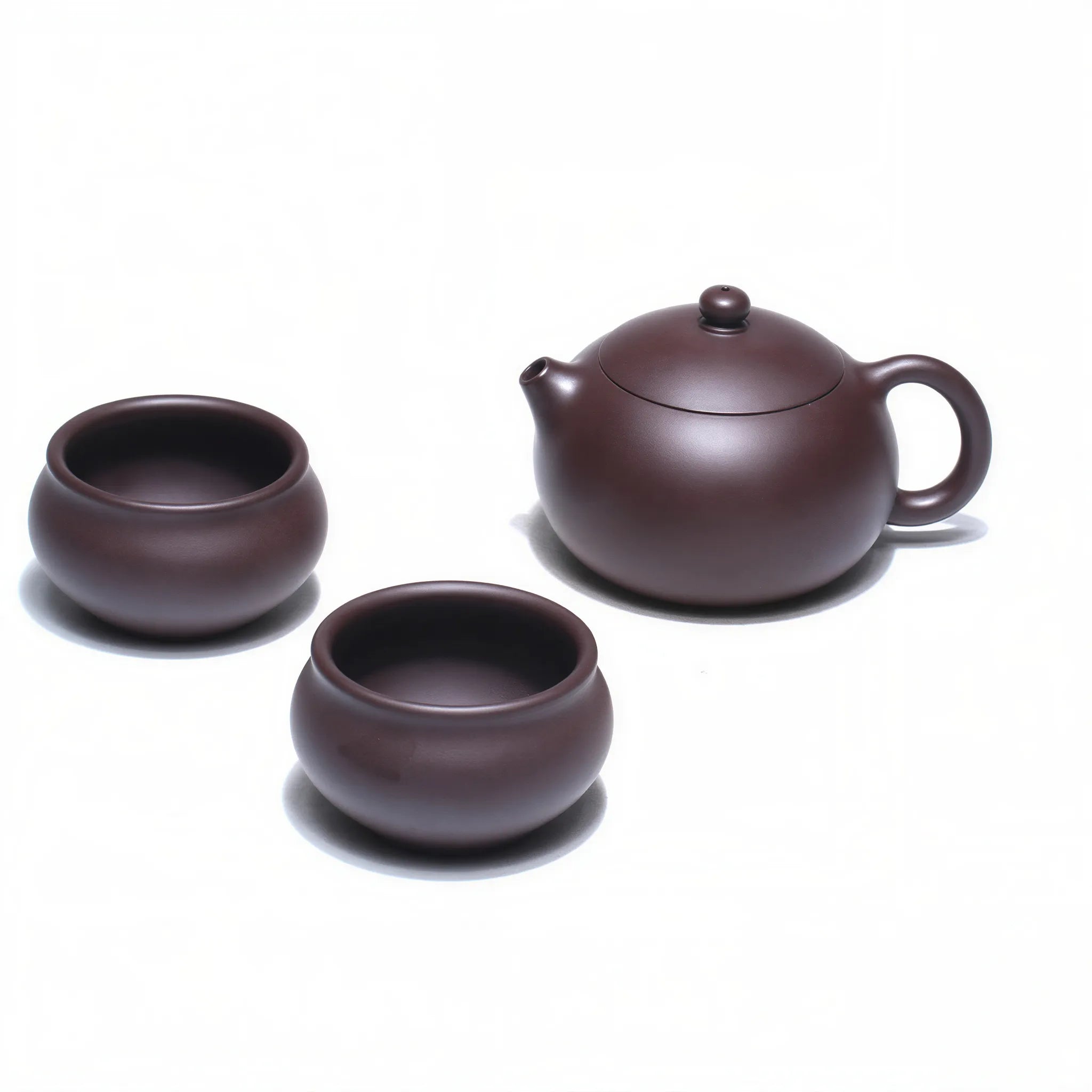 Huanglongshan Xishi teapot with two matching cups