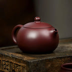 Huanglongshan zini Xishi teapot with matching cups