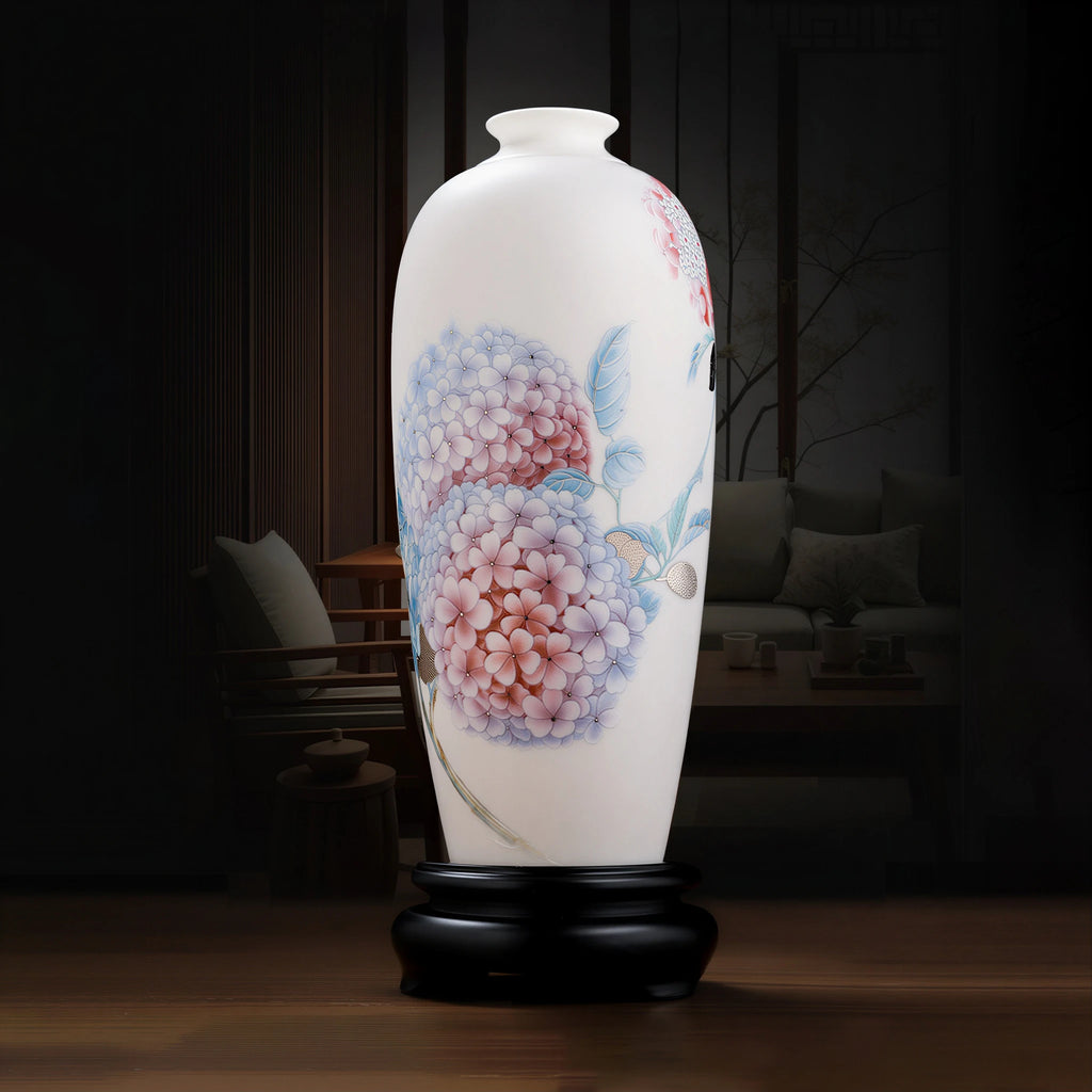 Full hydrangea Meiping vase on its wooden stand against a dark interior background