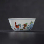 Side view of a Chenghua-style doucai chicken cup with gently flared sides