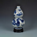 Front view of a Jingdezhen double-gourd vase with a cobalt-blue dragon and crackle glaze