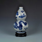 Front view of a Jingdezhen double-gourd vase with a cobalt-blue dragon and crackle glaze