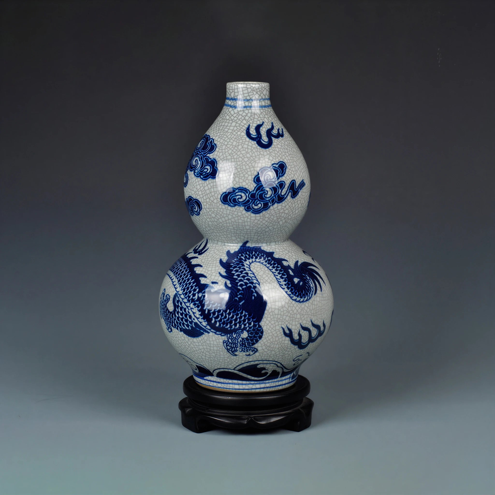 Front view of a Jingdezhen double-gourd vase with a cobalt-blue dragon and crackle glaze