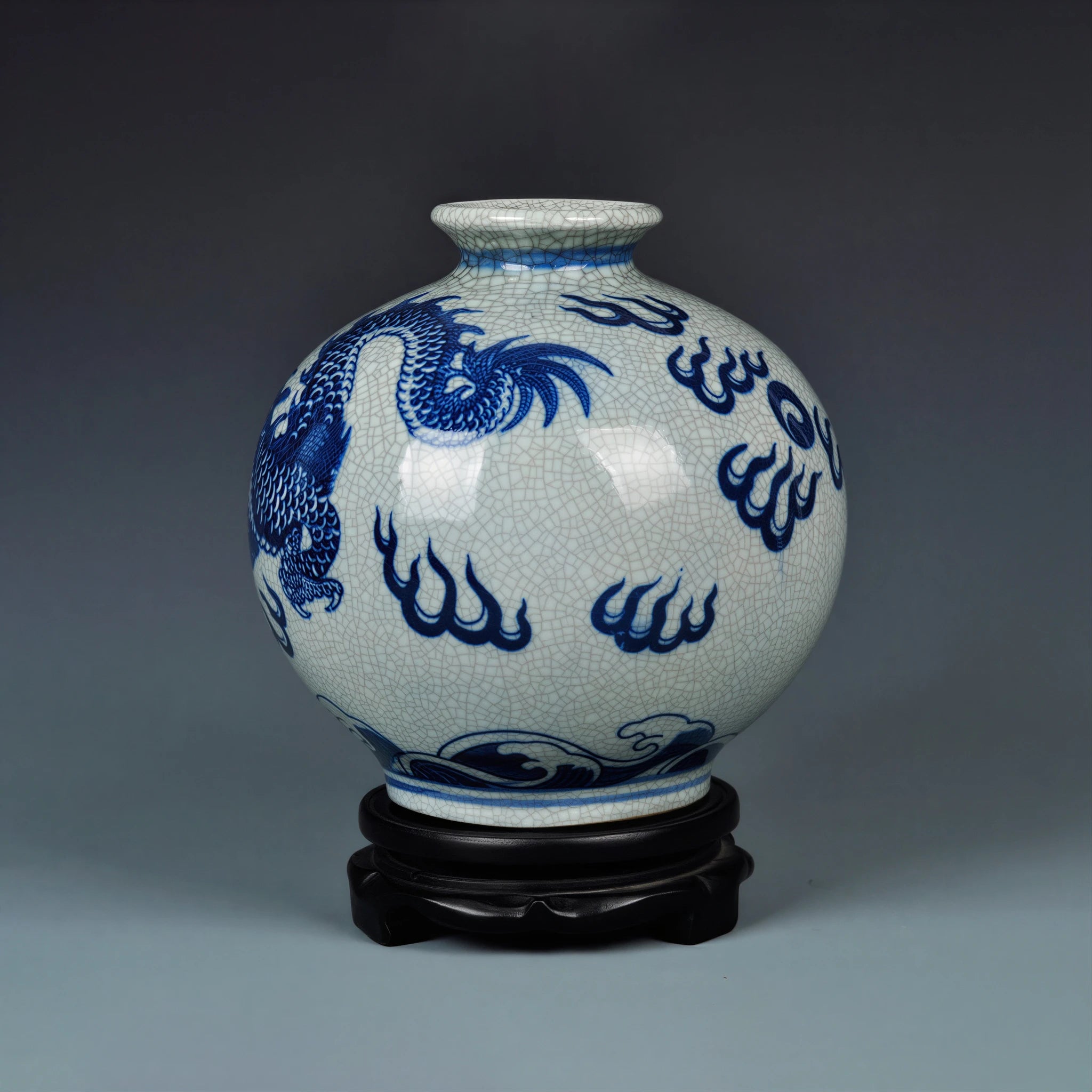 Front view of a wide-mouth Jingdezhen vase with cobalt-blue dragon decoration and crackle glaze