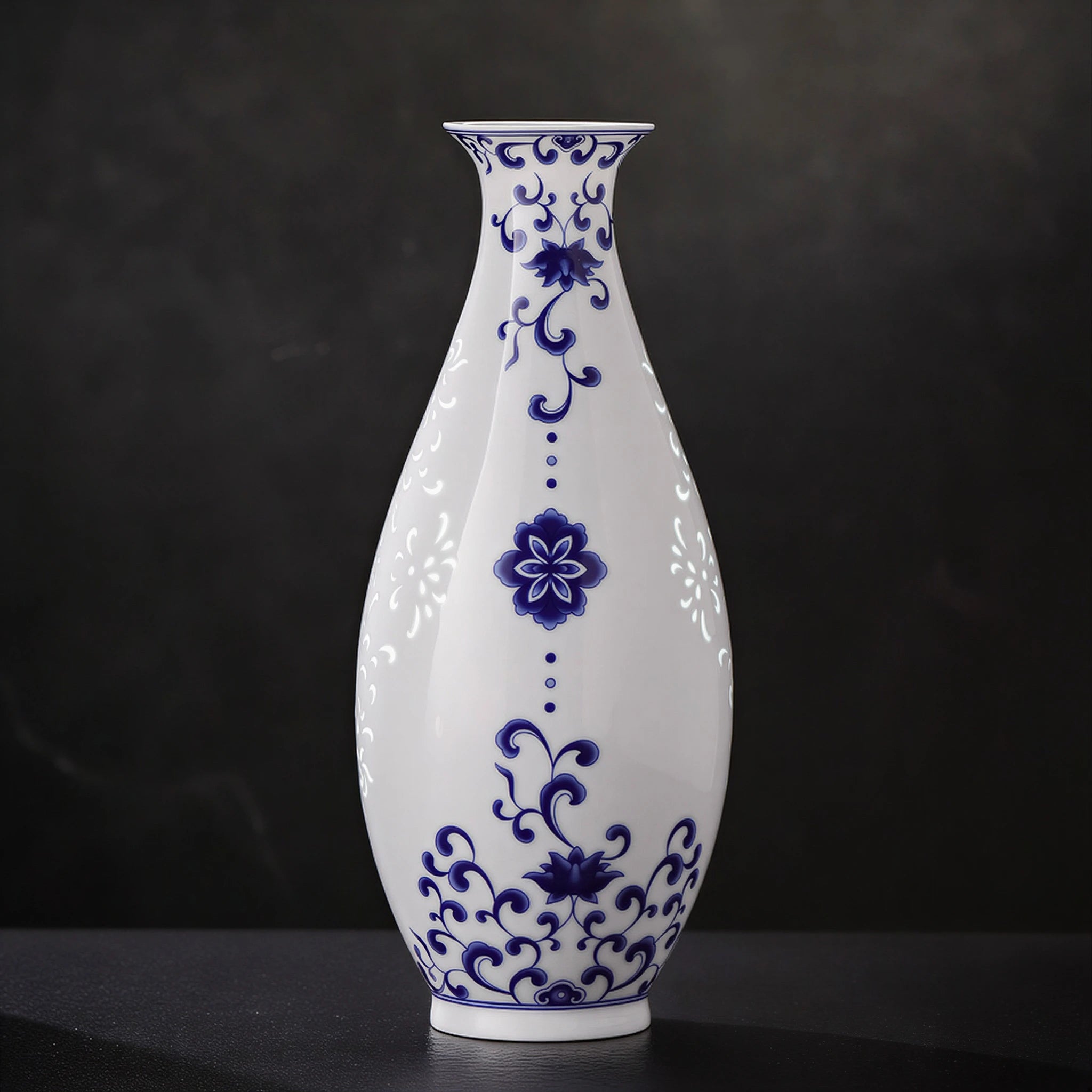 Front view of a Jingdezhen Guanyin vase with cobalt lotus scrolls and white linglong windows