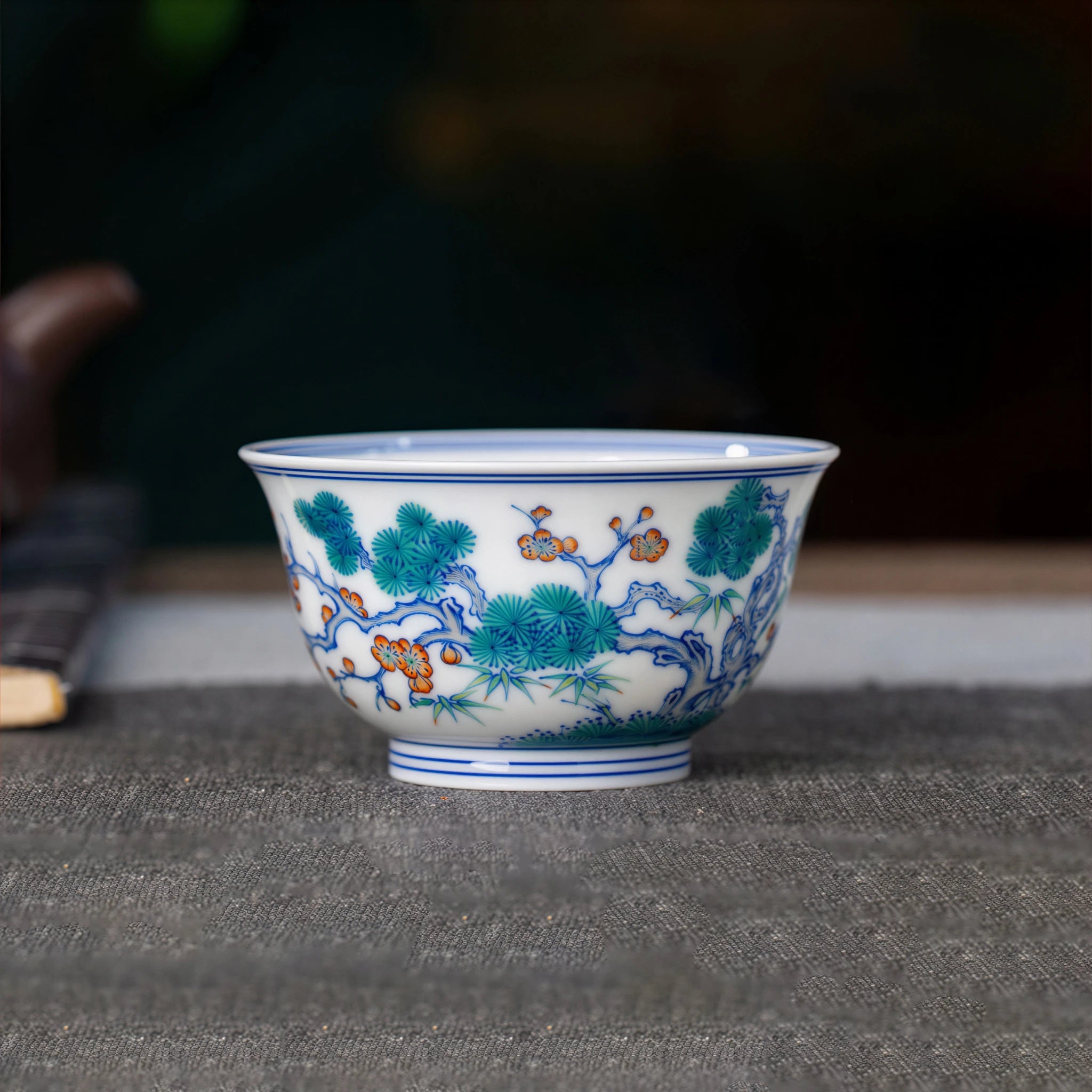 Jingdezhen doucai teacup with pine, bamboo and plum