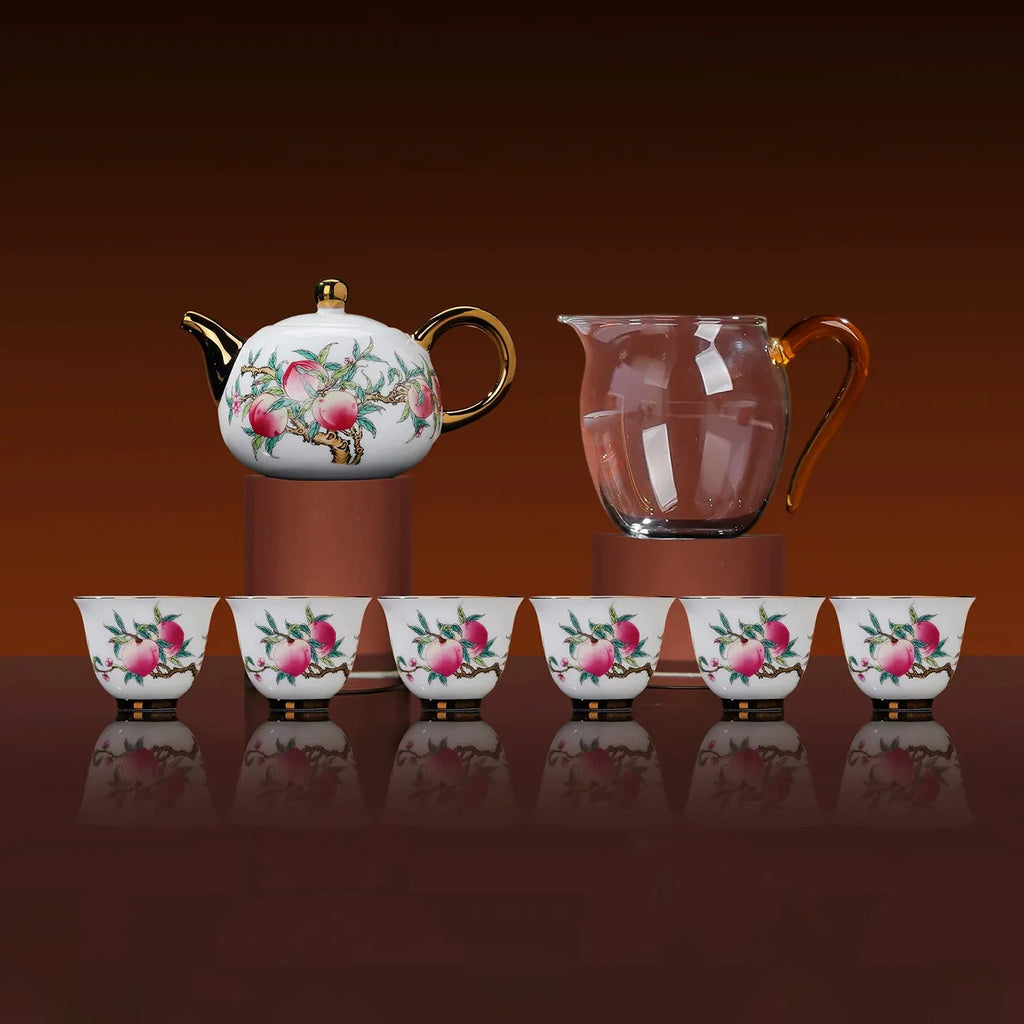 Eight-piece famille rose tea set with teapot, pitcher, and six cups