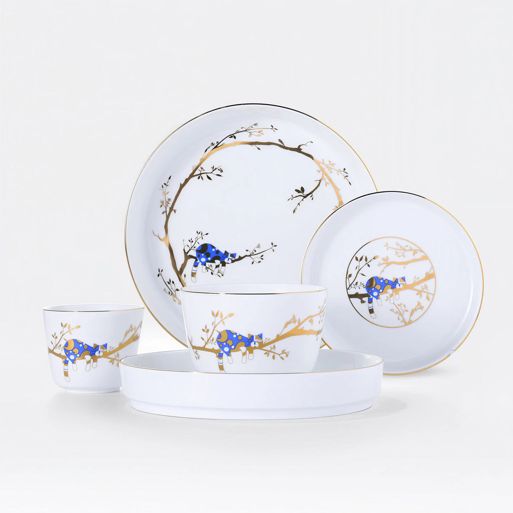 Five-piece Jingdezhen Forest Rest porcelain tableware set with a blue cat and gold branch decoration on a white background.