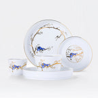 Five-piece Jingdezhen Forest Rest porcelain tableware set with a blue cat and gold branch decoration on a white background.