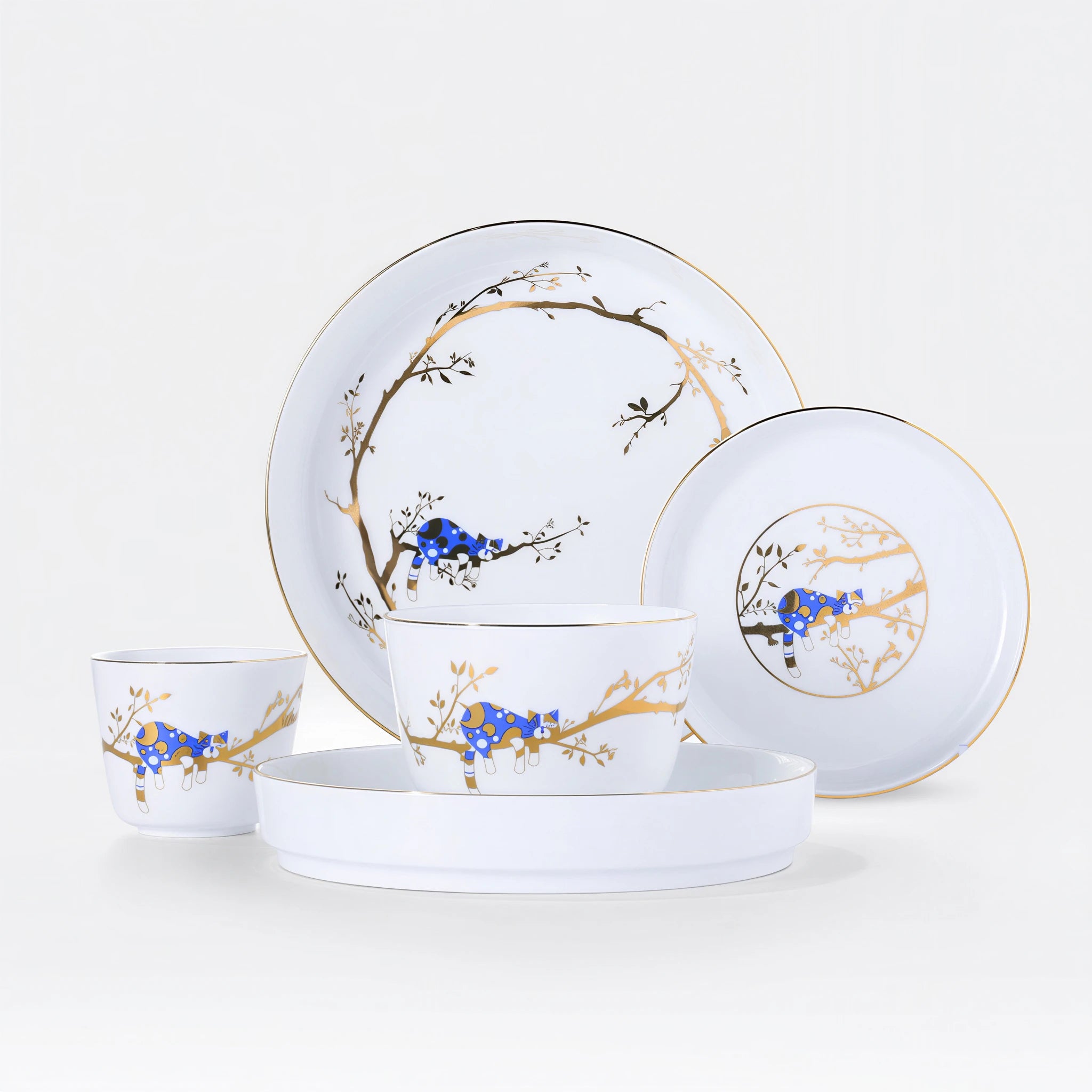 Five-piece Jingdezhen Forest Rest porcelain tableware set with a blue cat and gold branch decoration on a white background.