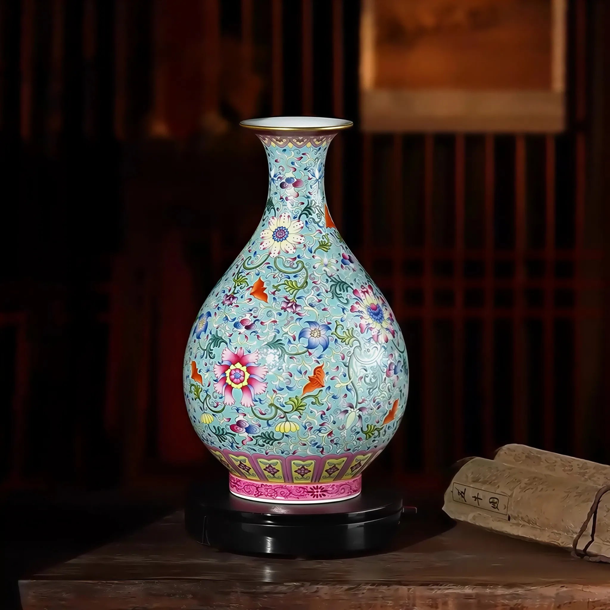 Green-ground famille rose Yuhuchun vase in an interior