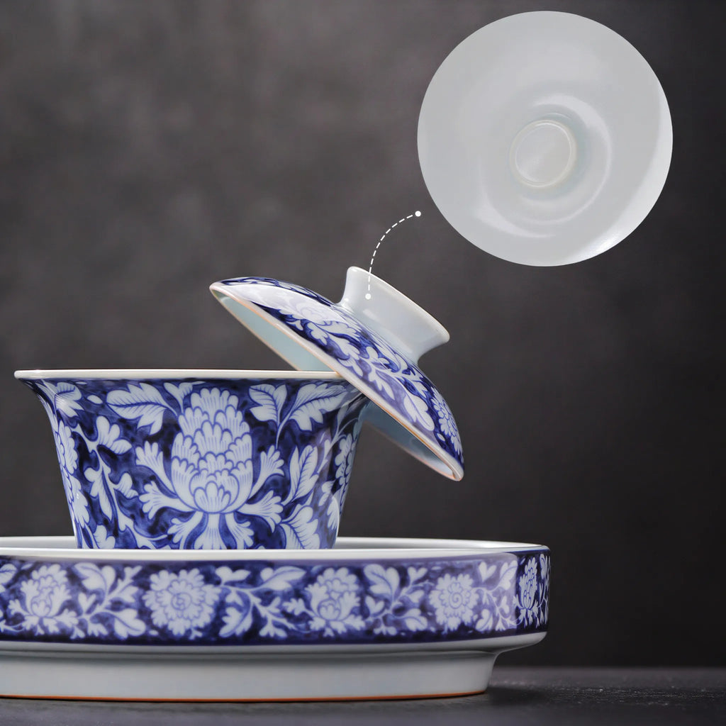 Lid fit and flared rim of the in-glaze peony gaiwan