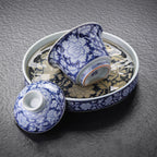 Ceramic tea stage catching water during gongfu brewing