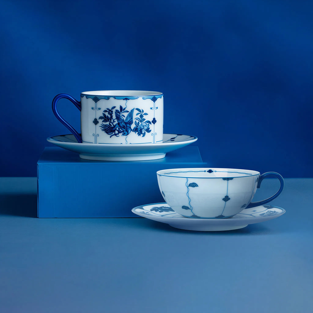 Ribbon bird porcelain coffee cup and saucer on a minimalist table