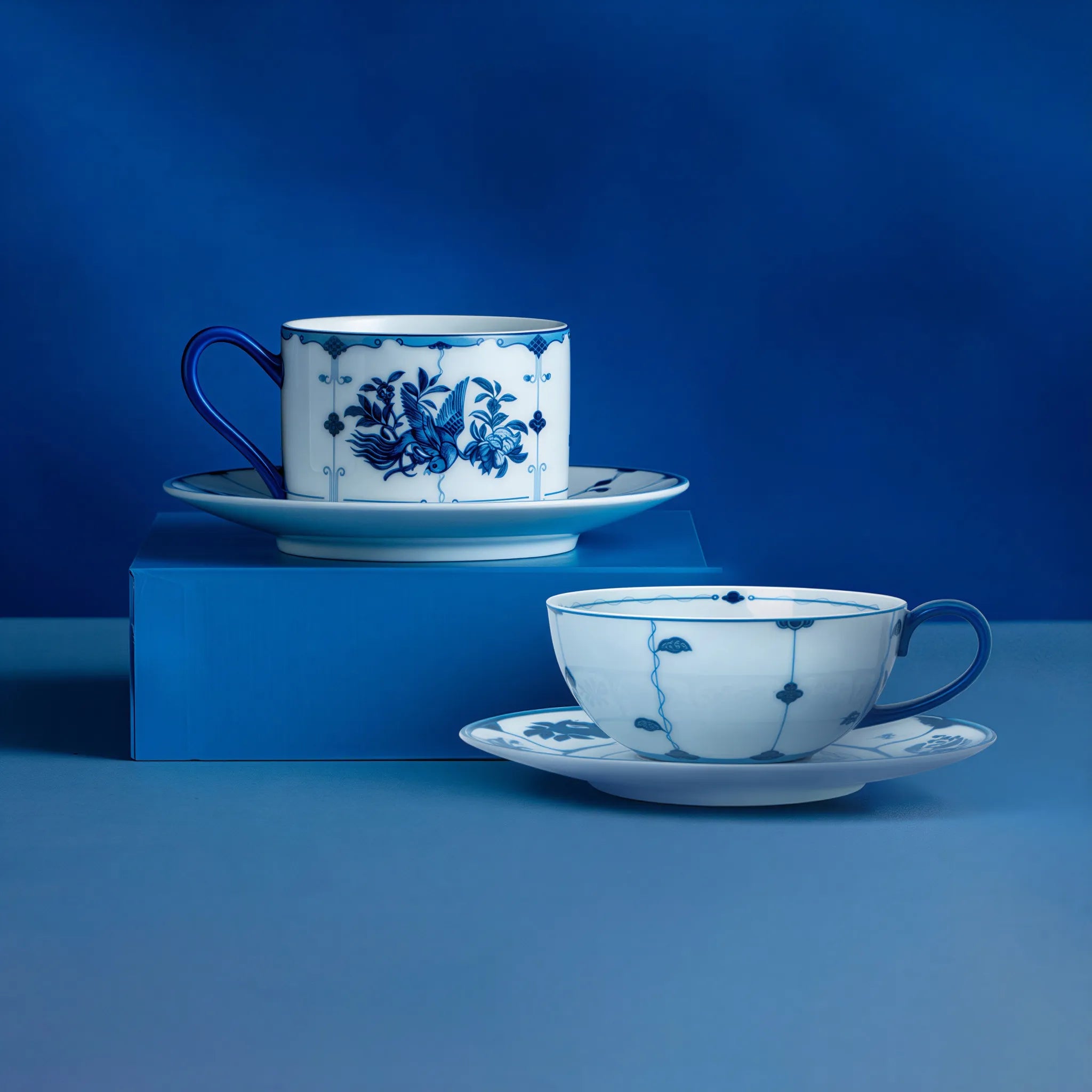Ribbon bird porcelain coffee cup and saucer on a minimalist table